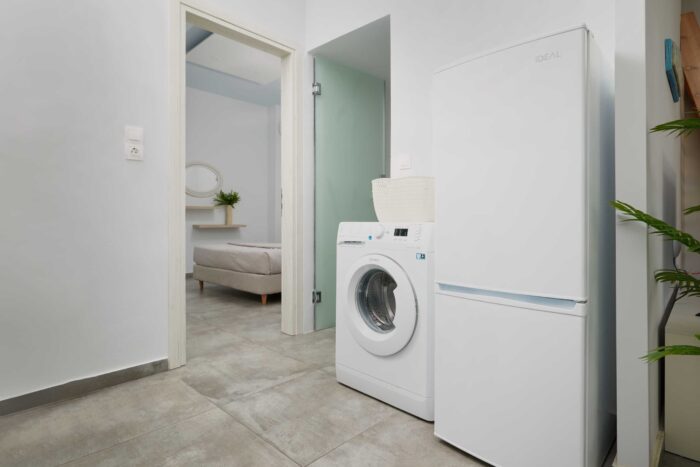 Open-plan living room and kitchen in family apartment in Ierapetra