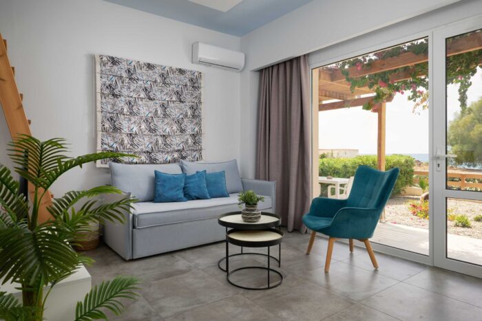 Open-plan living room and kitchen in family apartment in Ierapetra