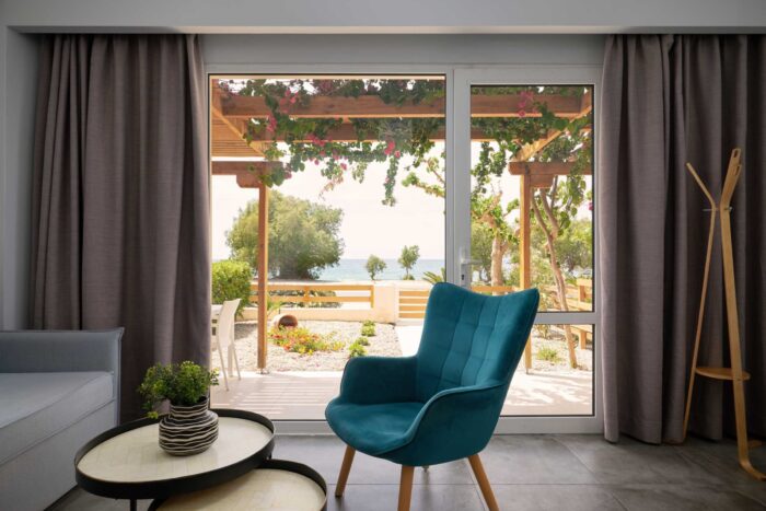 Open-plan living room and kitchen in family apartment in Ierapetra