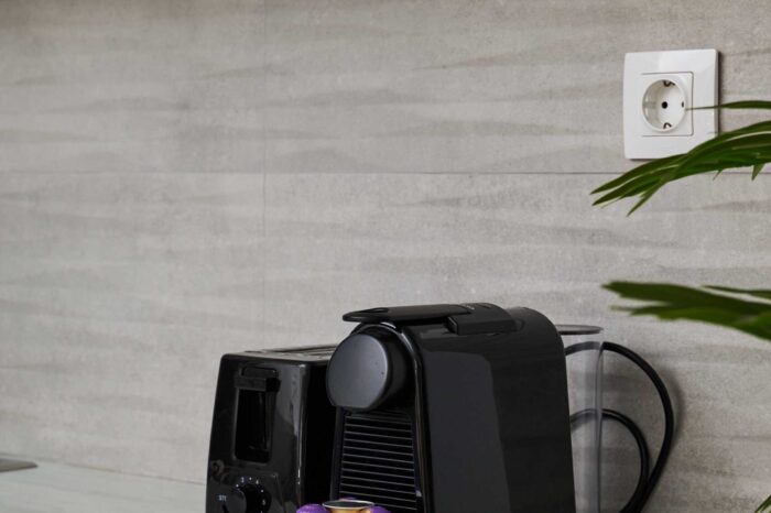 Open-plan living room and kitchen in family apartment in Ierapetra