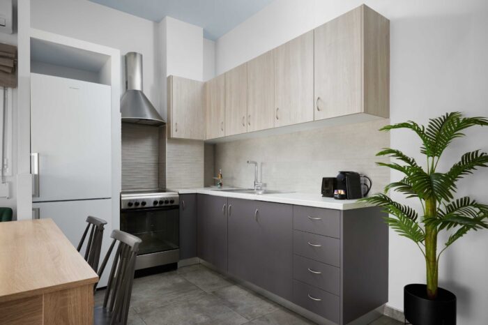 Open-plan living room and kitchen in family apartment in Ierapetra