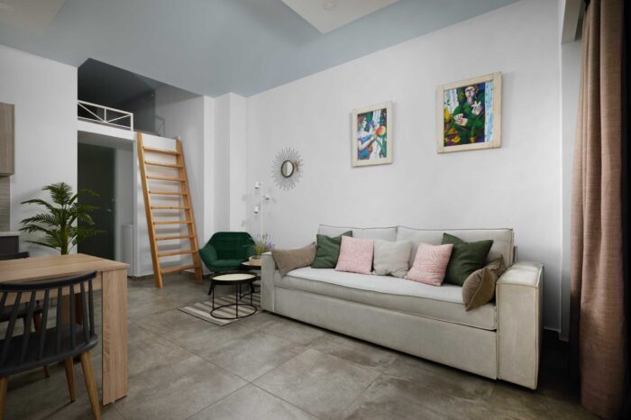 Open-plan living room and kitchen in family apartment in Ierapetra