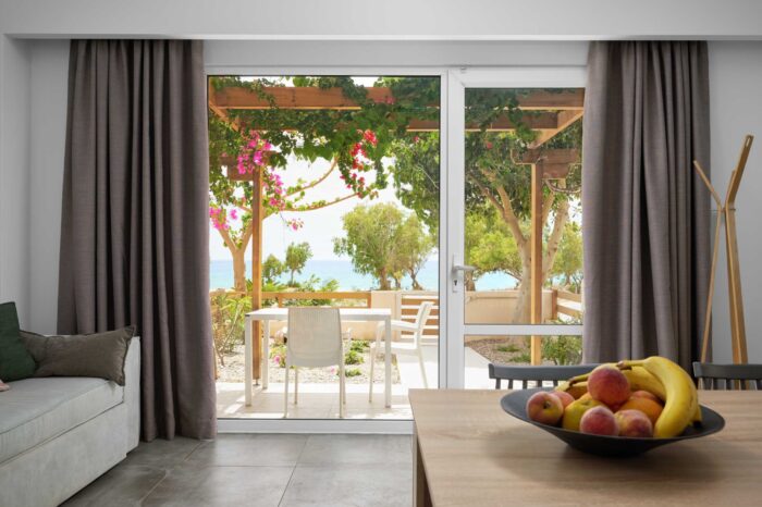 Open-plan living room and kitchen in family apartment in Ierapetra