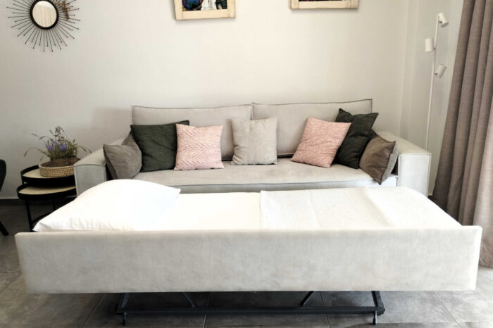 Open-plan living room and kitchen in family apartment in Ierapetra