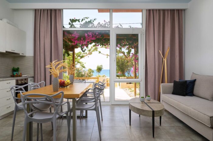 Open-plan living room and kitchen in family apartment in Ierapetra