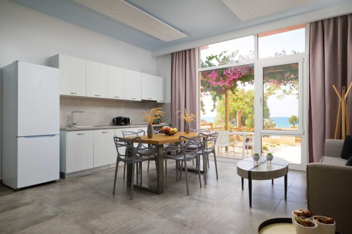 Open-plan living room and kitchen in family apartment in Ierapetra