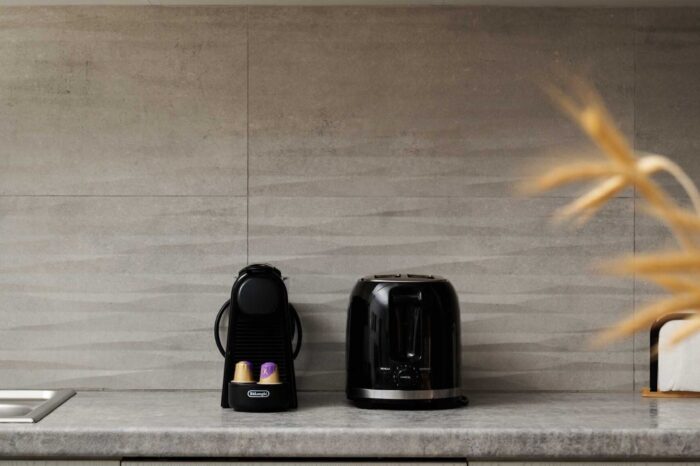 Open-plan living room and kitchen in family apartment in Ierapetra