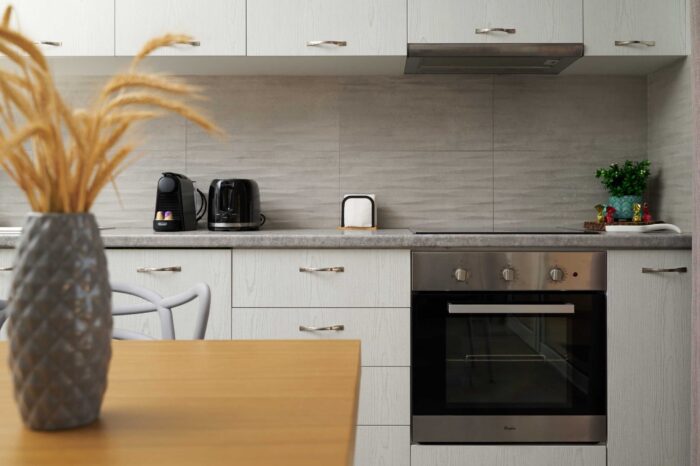 Open-plan living room and kitchen in family apartment in Ierapetra